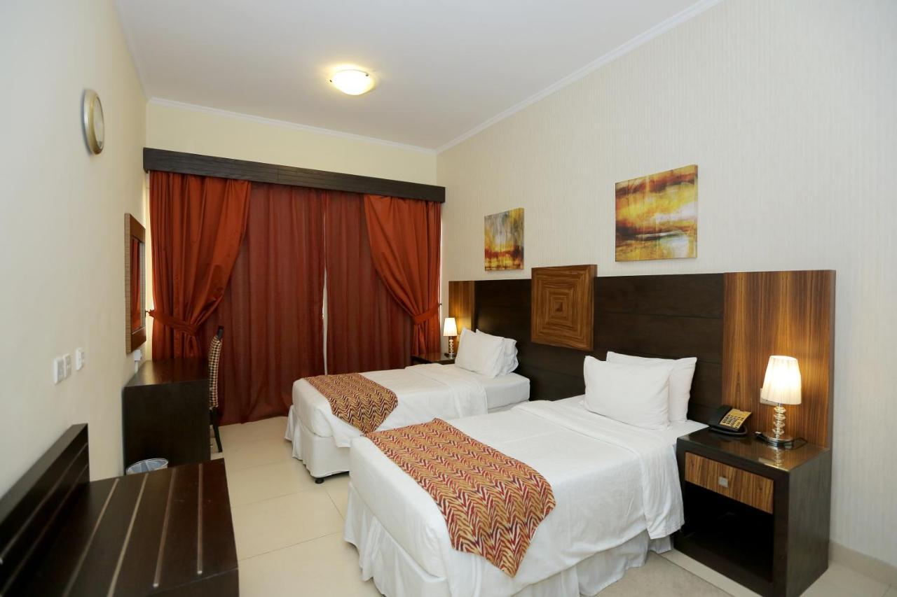 Ivory Grand Hotel Apartments Дубай Екстер'єр фото