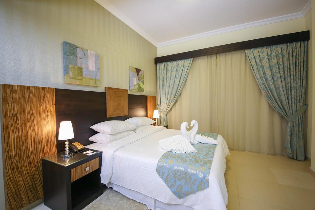 Ivory Grand Hotel Apartments Дубай Екстер'єр фото