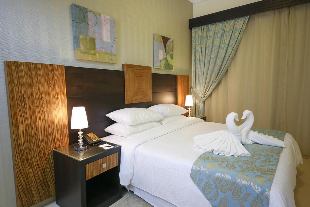 Ivory Grand Hotel Apartments Дубай Екстер'єр фото
